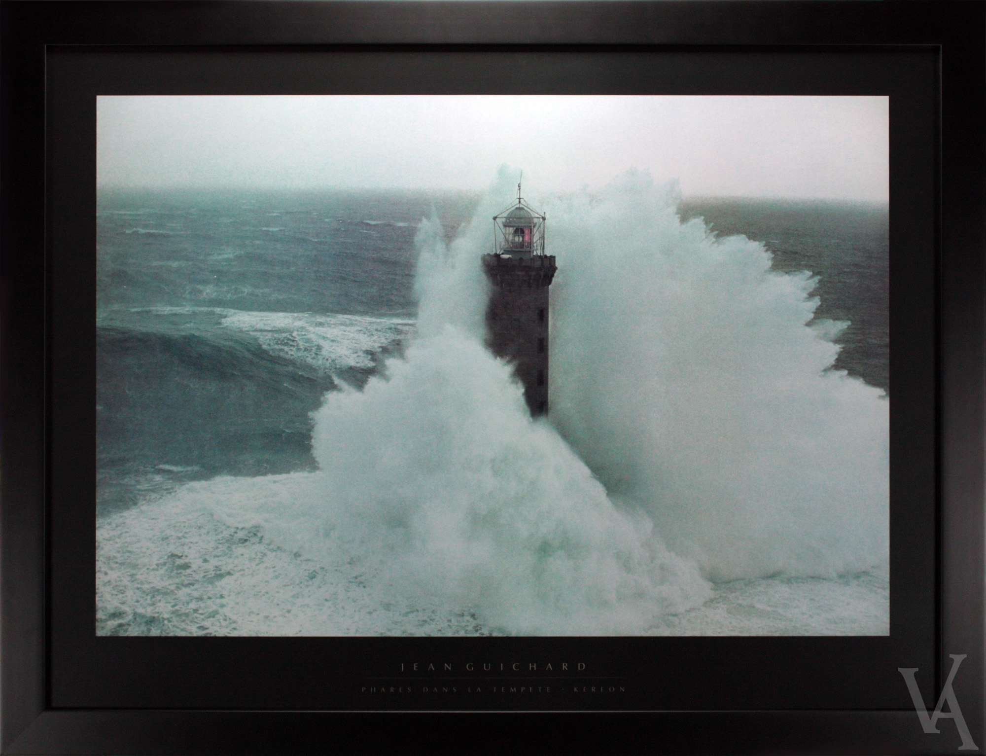 Jean Guichard ocean photography framed art print. Wave Surrounding The Lighthouse wall art.
