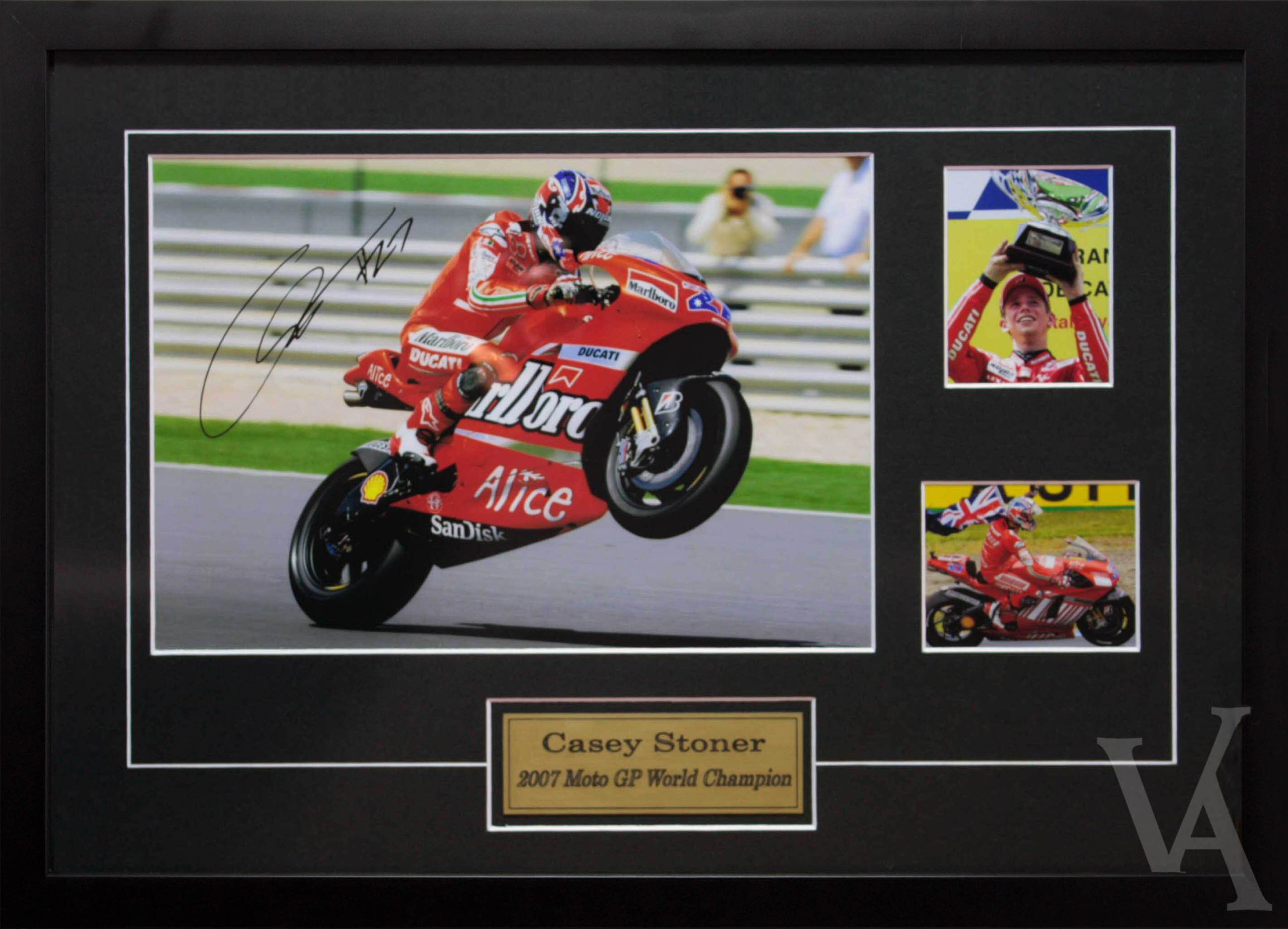 Casey Stoner Signed & Framed Moto GP Racing Memorabilia. Team Ducati Moto GP World Champion.